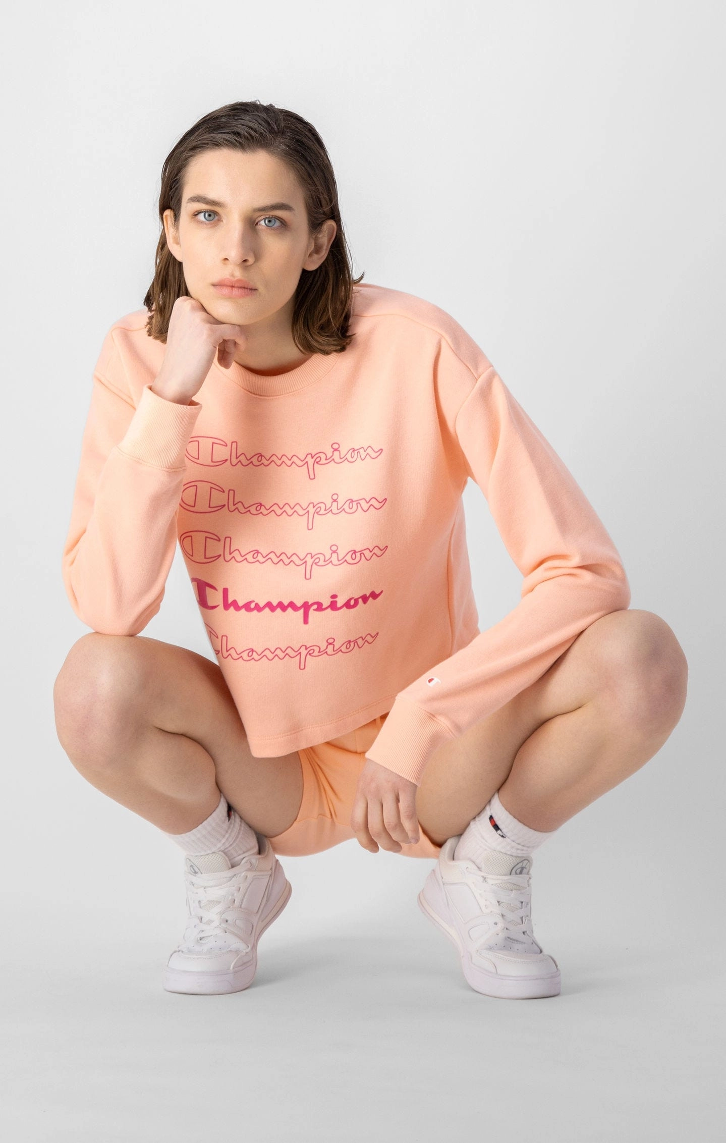 Sweatshirt in Kastenform mit wiederholtem Logo-Schriftzug