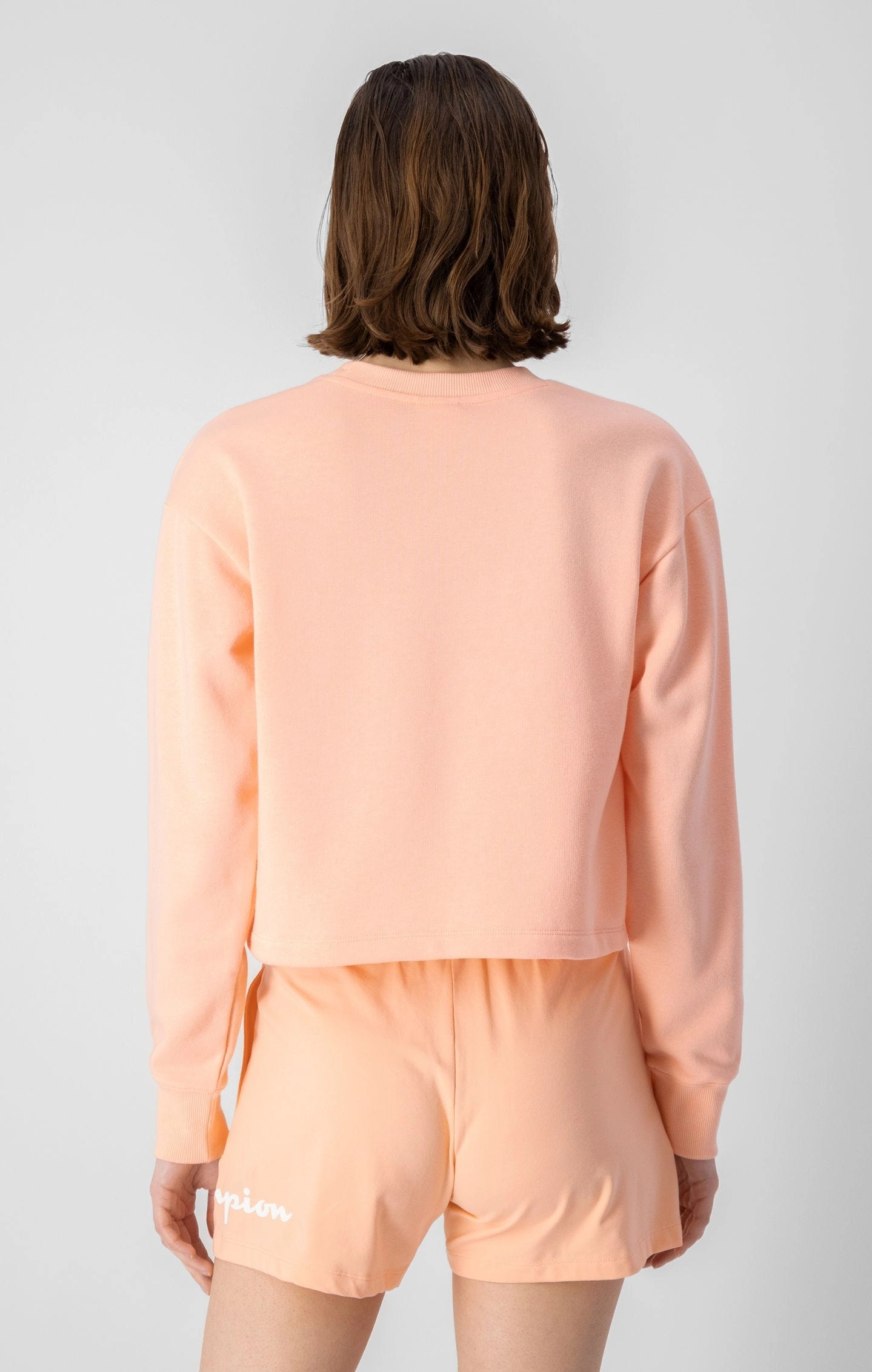 Sweatshirt in Kastenform mit wiederholtem Logo-Schriftzug