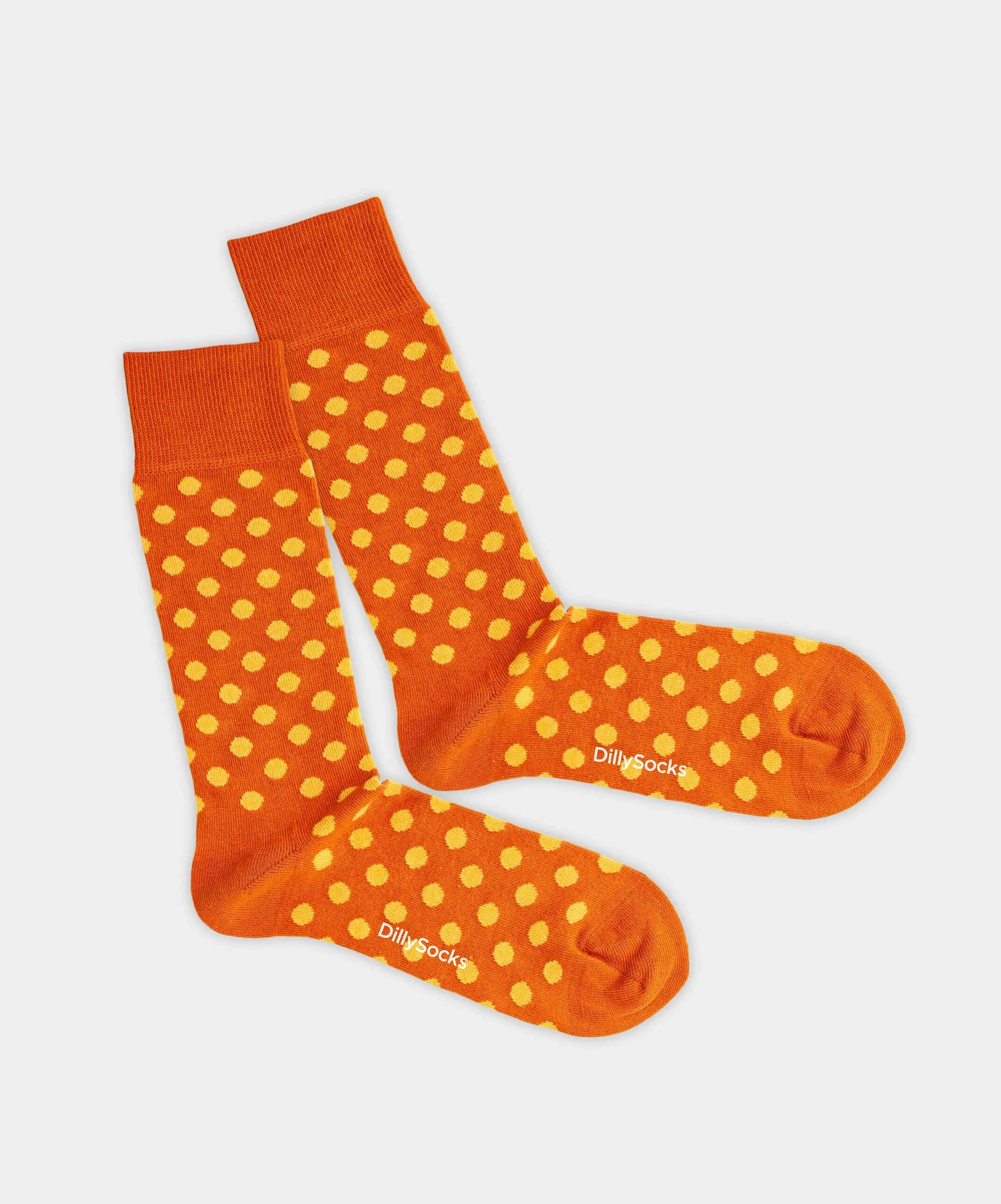 - Socken in Orange mit Punkte Motiv/Muster