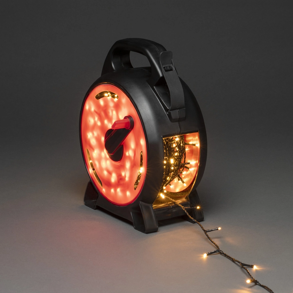 KONSTSMIDE Micro LED Lichterkette mit Kabelaufroller, 200 bernsteinfarb. Dioden, 30V, Außen(IP44), Soft-Kabel