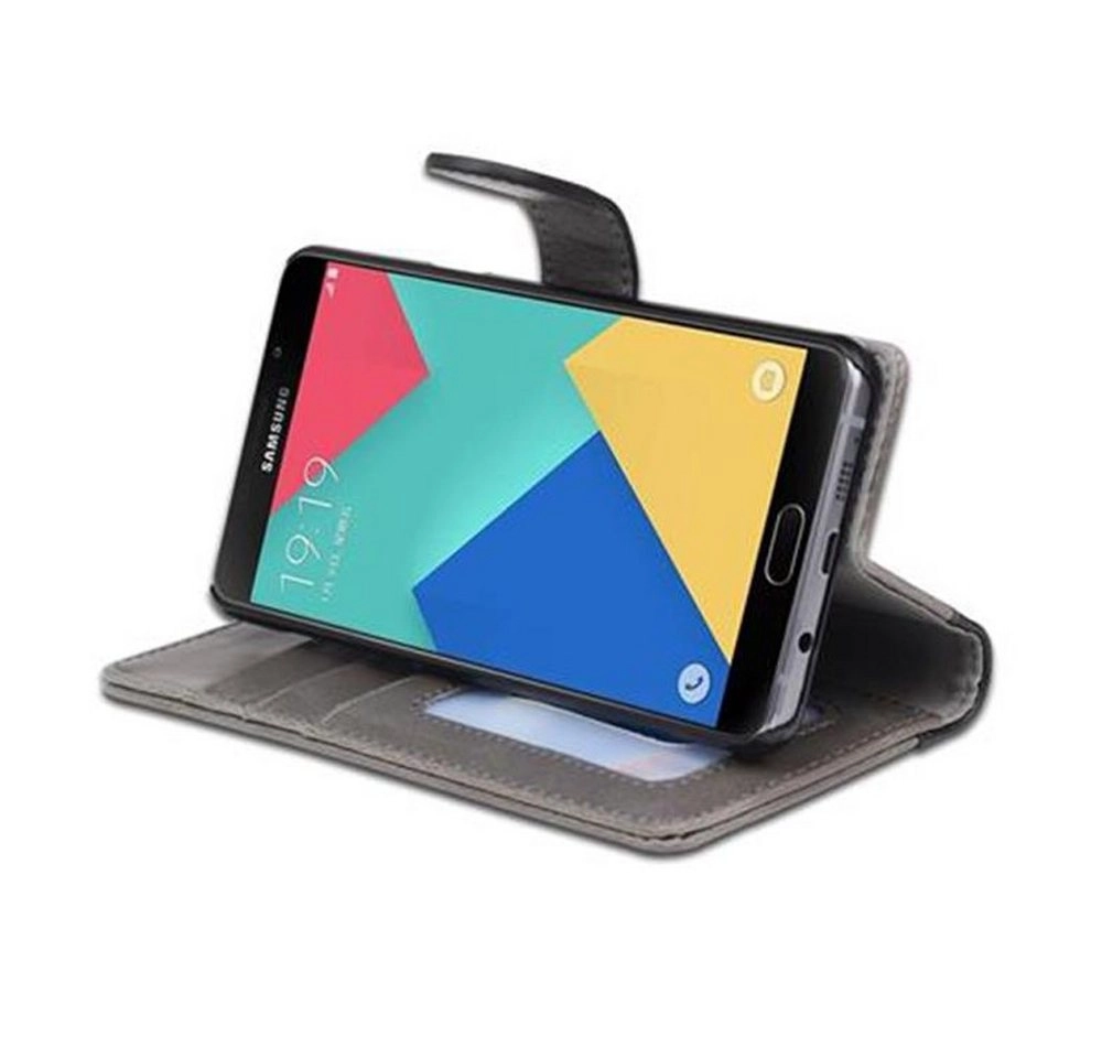 Cadorabo Hülle für Samsung Galaxy A5 2016 - Hülle in GRAU SCHWARZ ? Handyhülle mit Standfunktion und Kartenfach im zweifarbigen Design - Case Cover Schutzhülle Etui Tasche Book